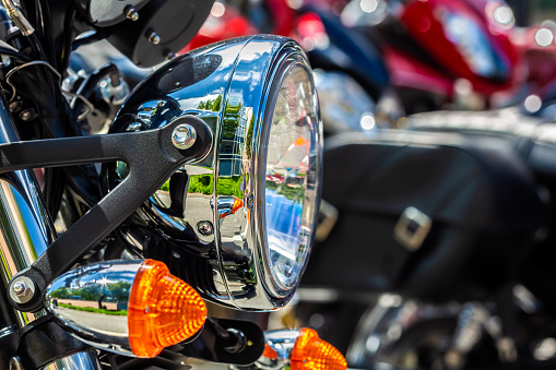 Szeged, Hungary - May 30th, 2015: Photo shoot of Yamaha Drag Star 1100 XVS classic bike from 2002, closeup shoot of a badge,name of the bike and reservoir. 4-stroke SOHC V-twin engine, 1063cc. Photographed outdoors,near city center in Szeged, Hungary.