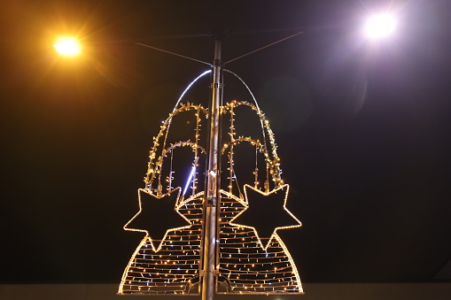 Ingelheim am Rhein, Germany - December 08, 2023: Street Illuminated ornament.