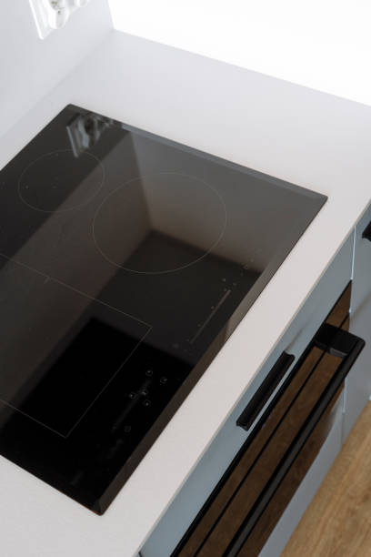 istock High angle shot of induction stove with control panel and clean surface in kitchen 1846836014