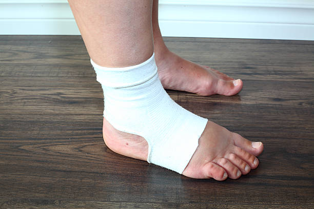 istock Swollen foot in compression sock during pregnancy 184684606