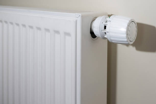 istock Heating Radiator, White radiator in an apartment 1846860189