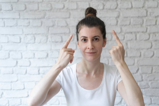 istock Positive young woman thinking 1846861347