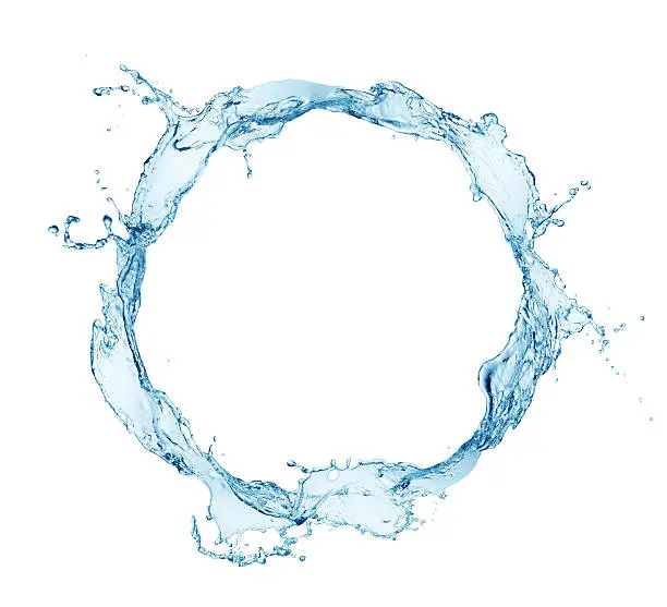 Photo of A ring of blue water splashing against a white background