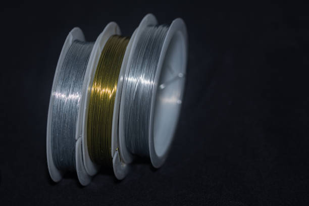 istock silver and gold wire in spools for arts and crafts. 1846888720