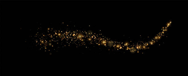 istock christmas light effect, sparkling magic dust particles.a trail of golden particles. A trail of stardust. Space sparkling. 1846907601