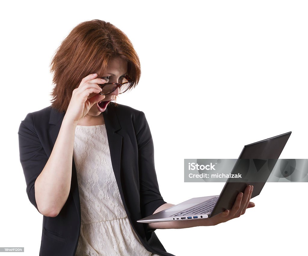 Mujer sorprendida con capacidad para computadora portátil - Foto de stock de Adolescente libre de derechos