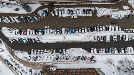 Drone photography parking place in a city during winter day