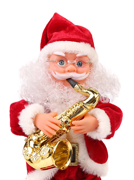 istock Santa Claus doll with saxophone. 184694210