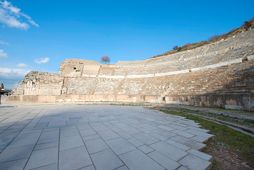 The Theatre of Ephesus (Efes) at Selcuk in Izmir Province, Turkey. The amphitheatre is the largest in the ancient world for gladiatorial combats and drama. Ephesus is a popular tourist destination.
