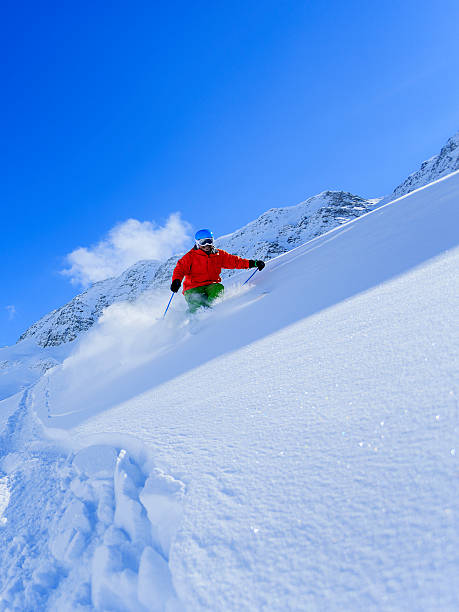 istock Skiing, Skier, Freeride in fresh powder snow. 184695632