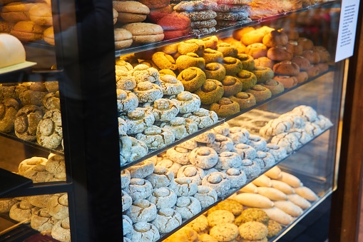 A showcase of oriental sweets and pastries. Pastry shop - cafe on the street.
