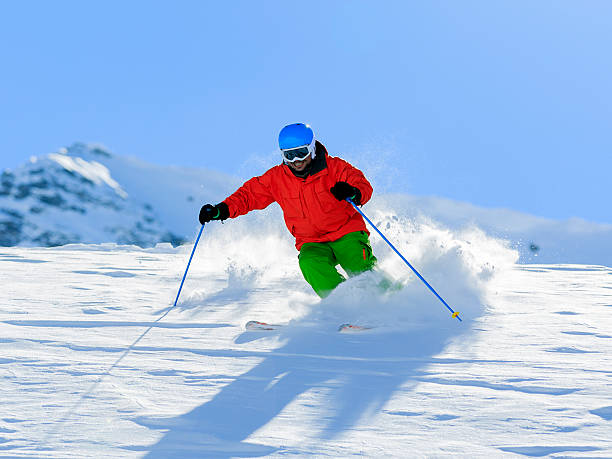 istock Skiing, Skier, Freeride in fresh powder snow. 184697589