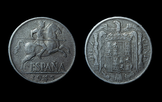 A black background with a Spanish 1945 10 cent coin