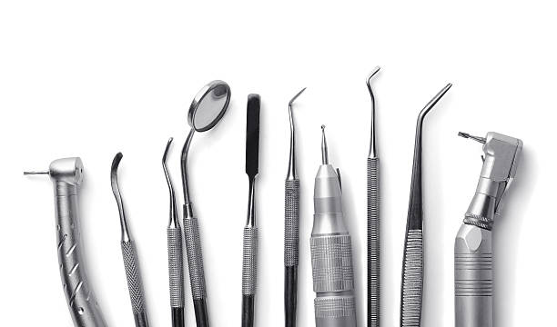 Dental equipment Row of various dental tools isolated on white dental drill stock pictures, royalty-free photos & images