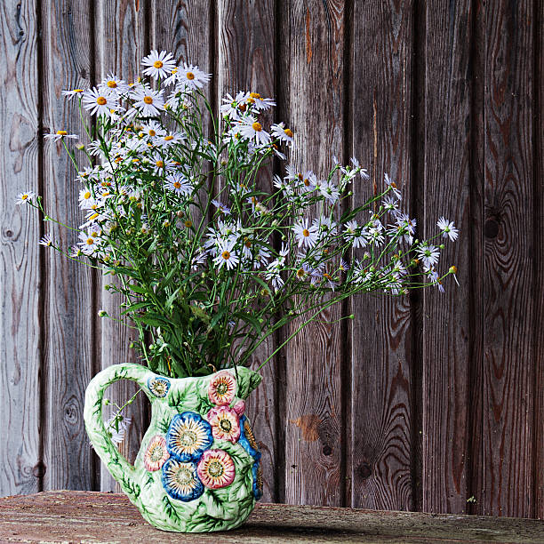 istock Still life with blue asters in vase. 184698332