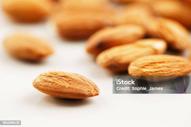 Handful Of Almonds On A White Background Stock Photo - Download Image Now - Almond, Almond Tree, Beauty