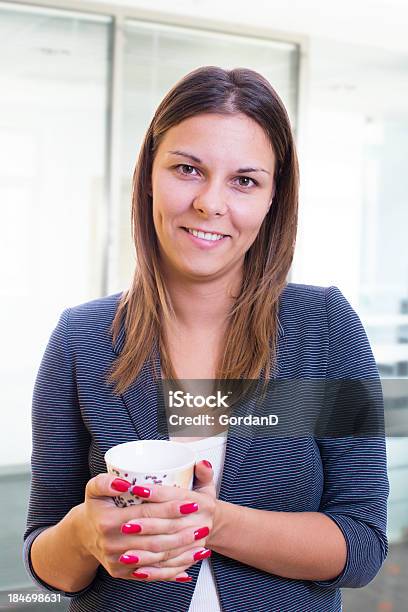 Young Businesswoman In Office With Coffee Stock Photo - Download Image Now - Adult, Adults Only, Beautiful People