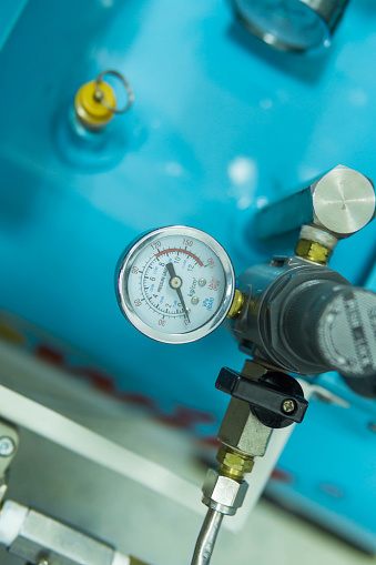 Pressure Gauge, pressure gauge on a gas regulator in a laboratory analytical equipment.