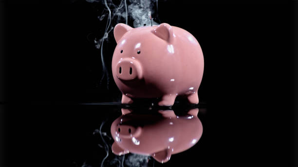 istock Piggy bank breaking 1847012249
