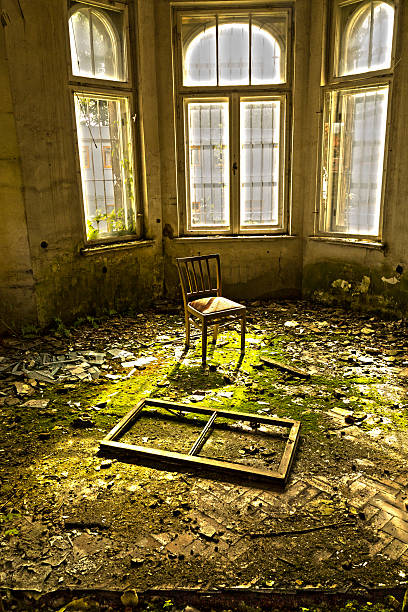 istock Old chair in an abandoned dilapidated house 184701446