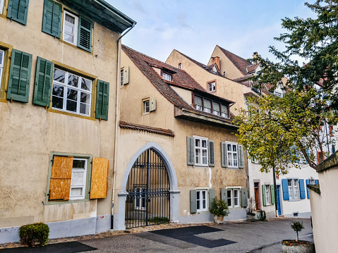 Houses in a quiet street at autumn in Basel, Switzerland.