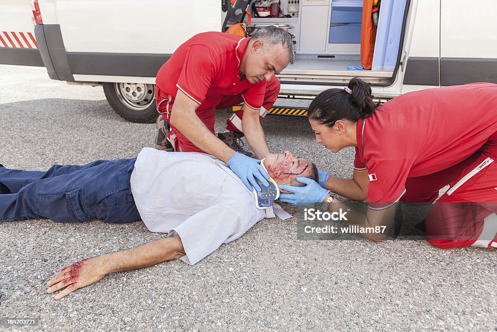 Rescue Team Providing First Aid Crash Stock Photo