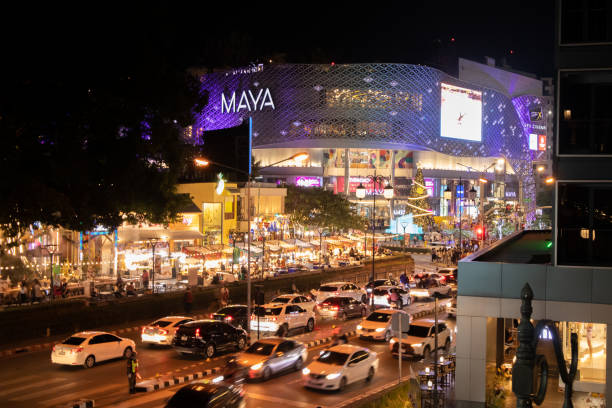 Food and music festival at One Nimman, a tourist attraction in the heart of Chiang Mai that is popular with many tourists when visiting. Chiang Mai, Thailand: December 07, 2023 - Department store in the heart of Chiang Mai city, Maya, at night and the atmosphere of traffic jams and people crossing the road. chiang mai city stock pictures, royalty-free photos & images