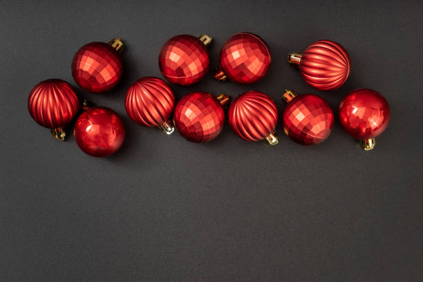 istock Christmas ball on black background Flat lay. New Year background top view with copy space. 1847076205