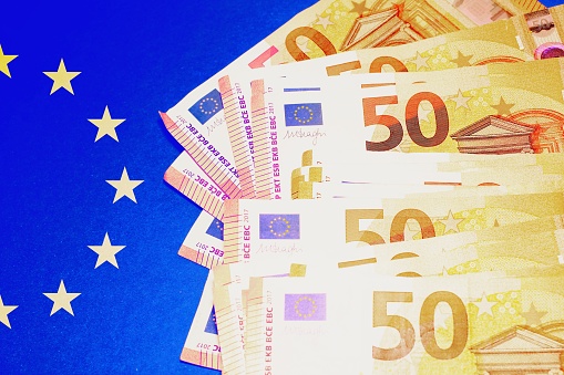 European flag with banknotes on a side.