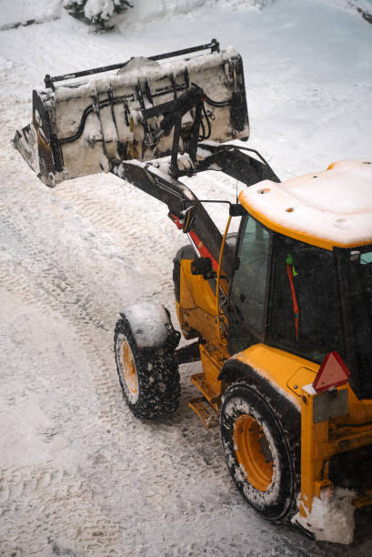 istock Tractor shoveling snow on the street. 1847099667