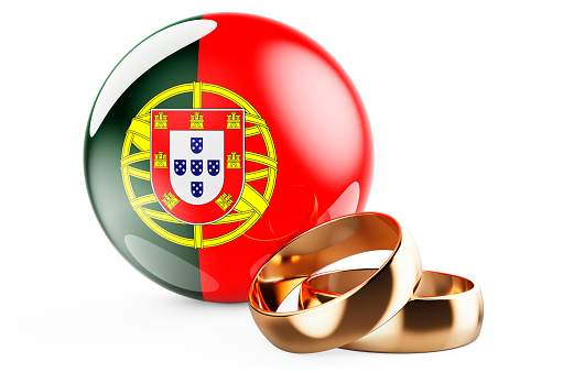 Weddings in Portugal concept. Wedding rings with Portuguese flag. 3D rendering isolated on white background