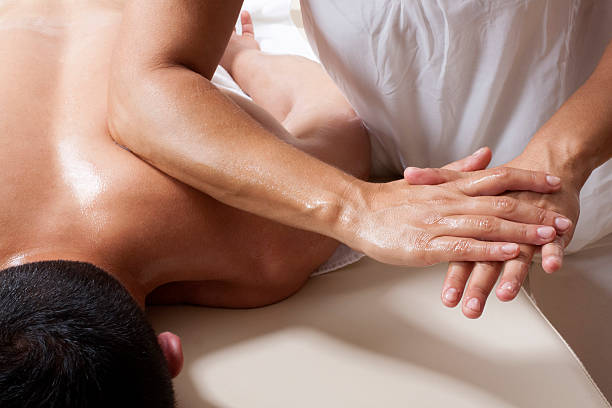 Massaggio Shiatsu di Trapeziues - foto stock