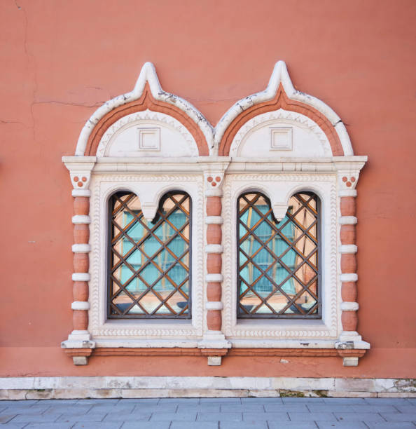 istock Antique windows on the old building. Architectural details 1847133500