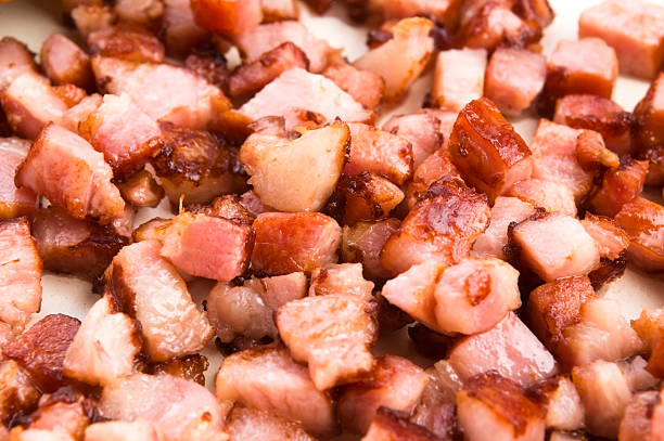 istock Macro photo of bacon being fried in a pan 184713743