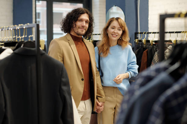 istock Young affectionate couple in quiet luxury apparel standing in boutique 1847142313
