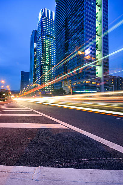 istock Traffic trails at twilight on the  cityscape background 184714330
