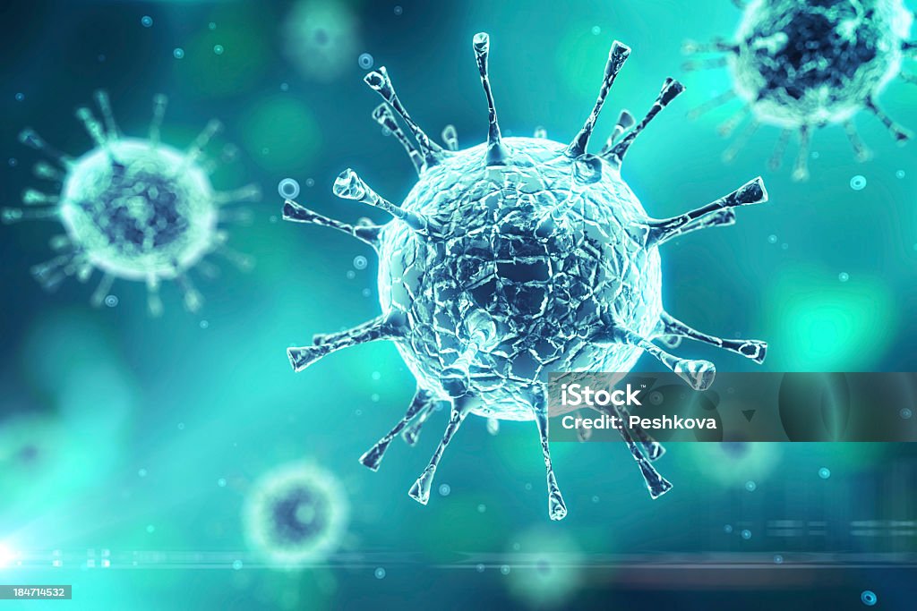 A blue colored biological microscopic virus virus on a blue background Virus Stock Photo