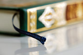 An macro image of bookmark in the Quran