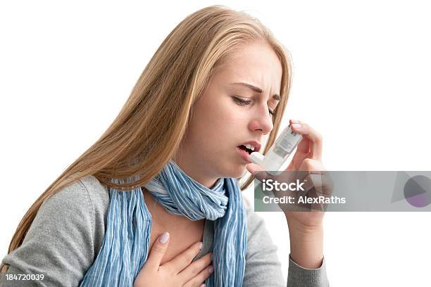 Young Lady Struggling To Breathe Using Asthma Inhaler Stock Photo - Download Image Now