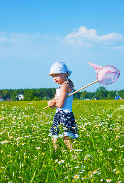 istock The small angry girl on a meadow 184720107