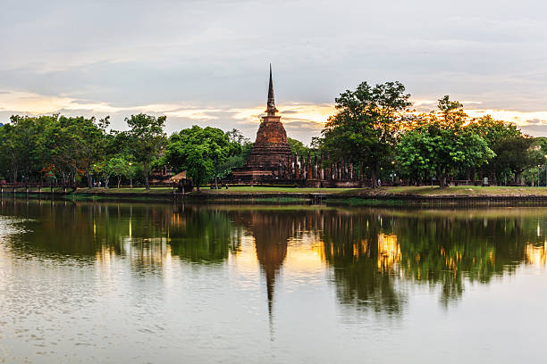 istock sunset with pagoda wat pra si sukhothai at thailand 184720198