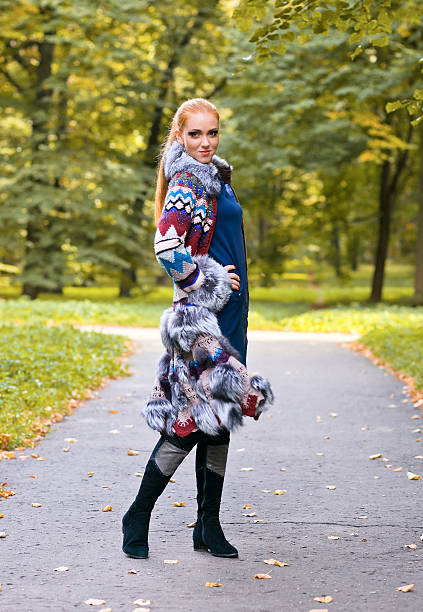 istock girl in a knitted coat 184722779