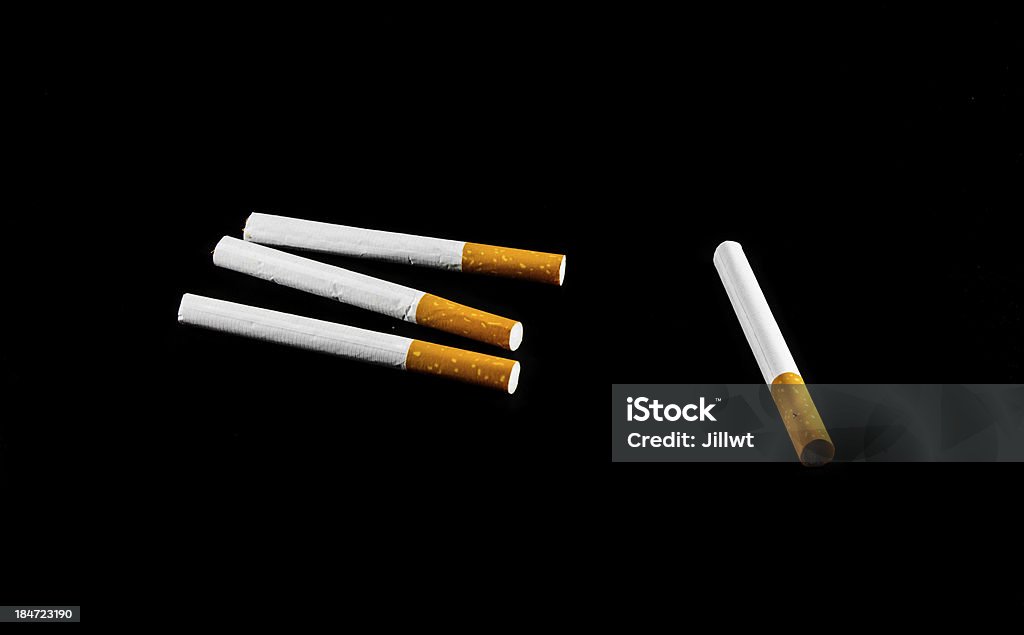 four cigarette general four cigarette isolated on black background Abstract Stock Photo