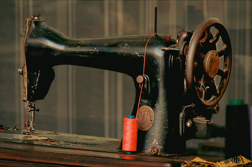 An old sewing machine, which can still be used due to good maintenance.  When I took this photo, this sewing machine was being used to sew pillow bags.