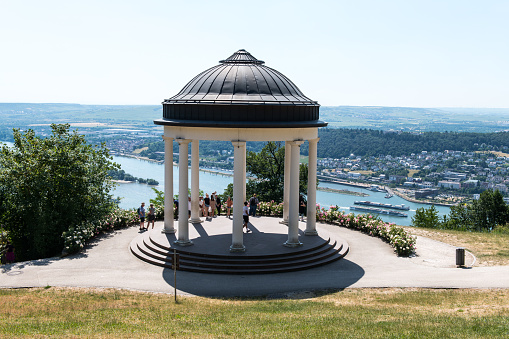 Pavilion and viewpoint overlooking the Rhine valley in the public park next to the Niederwald monument from 1883 on top of a hill near Rüdesheim am Rhein. The monument itself is almost 40 meters in height and was built in remembrance of the German unity after the French-German war of 1870-1871.
