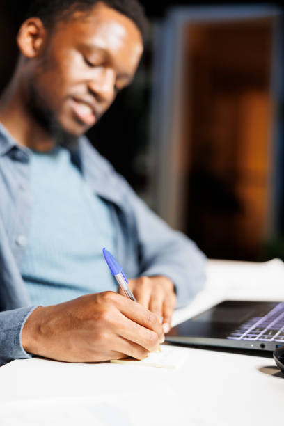 istock Business consultant creating adhesive notes memo at desk 1847266002