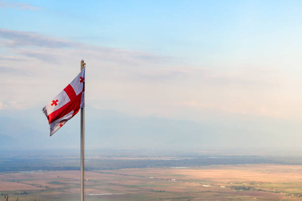 istock georgian flag over Alazan valley in twilight 1847268741
