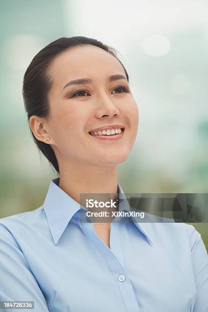 Smiling Young Woman Looking Up Stock Photo - Download Image Now - 25-29 Years, Adult, Adults Only