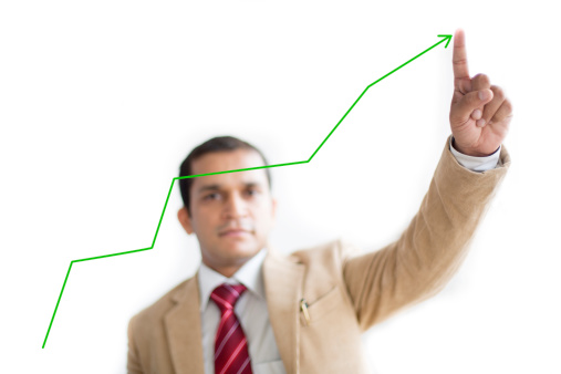 Businessman Presenting Financial growth curve. Isolated on white background.