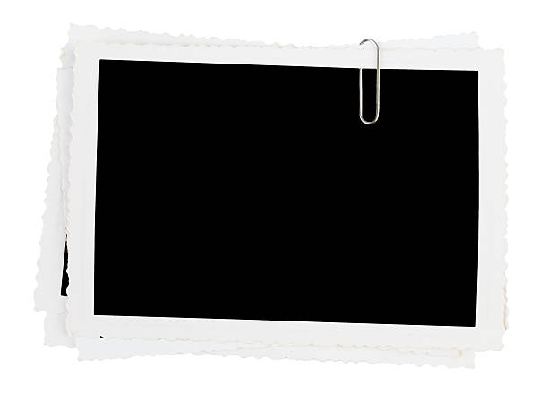 istock Pile of old photographs 184730073